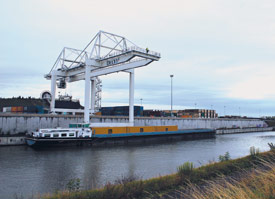 Barge at dock in the hub Delta 3 - Dourges - Lille